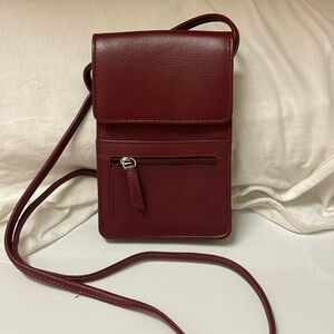 Burgundy RFID Blocking small crossbody. Bought for travel. Never used.